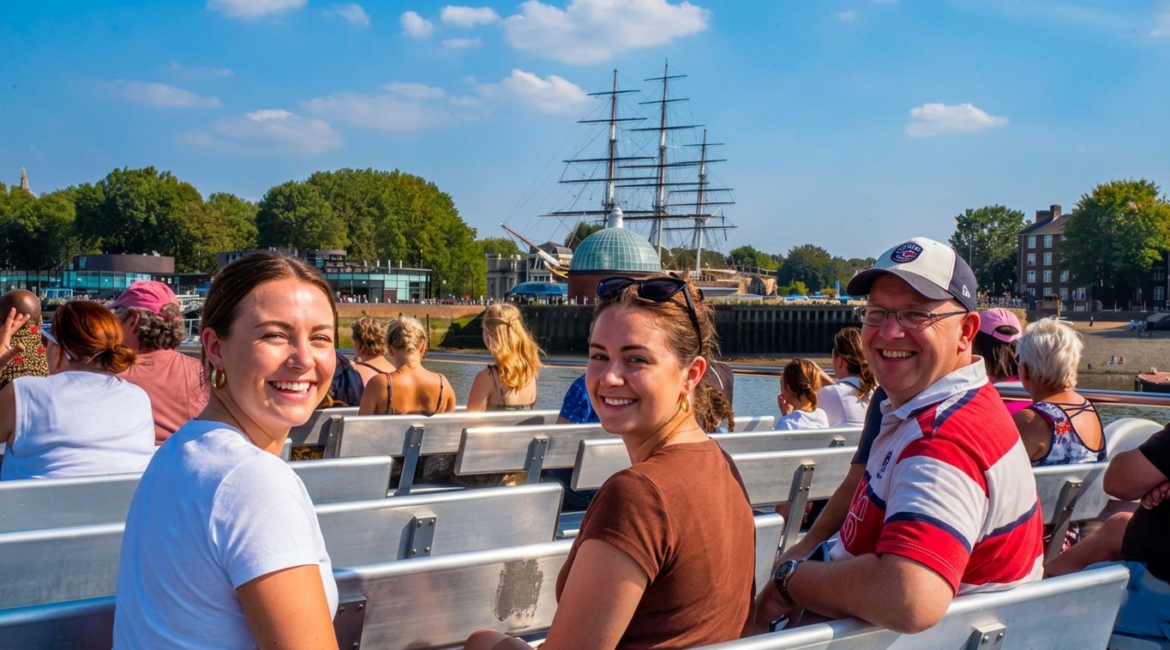 A happy family on a hop-on hop-off Thames River Sightseein cruise.