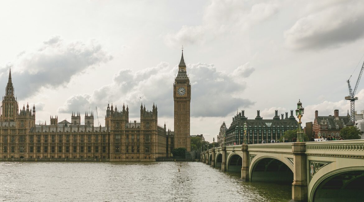 Westminster Bridge and the Elizabeth Tower (Big Ben) in London on a cloudy day.