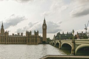 Westminster Bridge and the Elizabeth Tower (Big Ben) in London on a cloudy day.